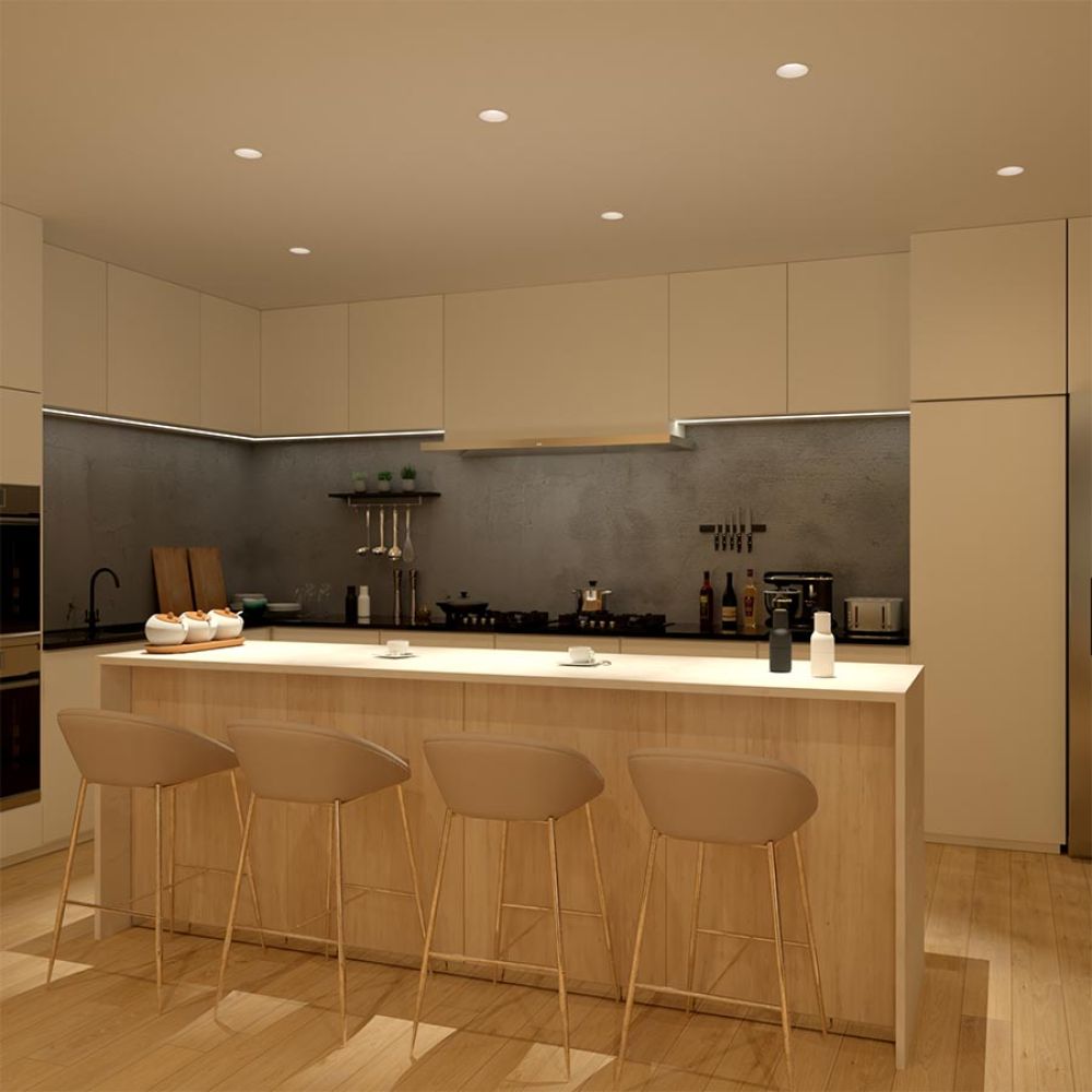 Minimalist kitchen with light wood island, recessed lighting, and grey backsplash